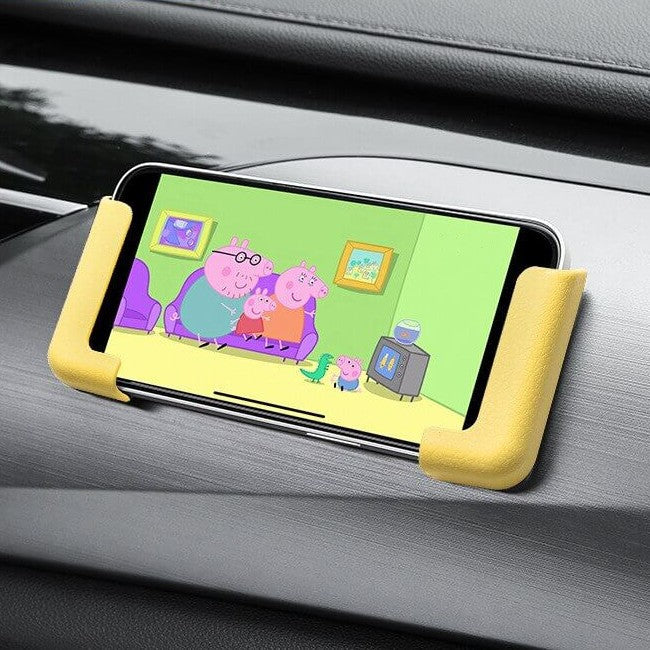 Självhäftande hållare för mobiltelefoner