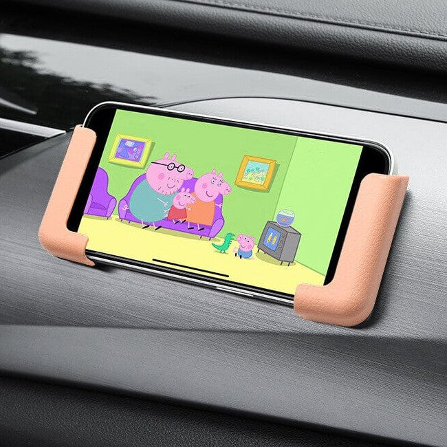 Självhäftande hållare för mobiltelefoner