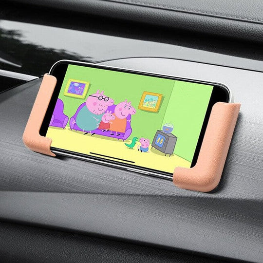 Självhäftande hållare för mobiltelefoner