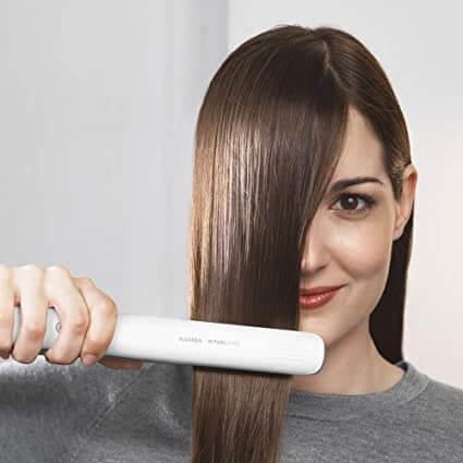 Styling hår strykjärn