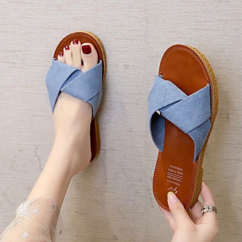 Sandaler med kors och tvärband