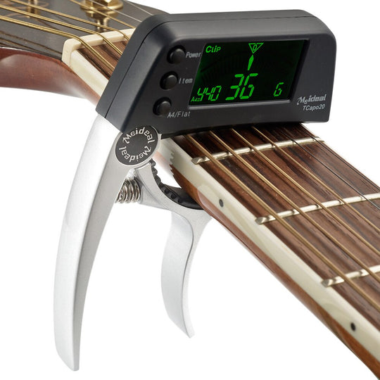 2-i-1 kapod och stämmare för gitarr
