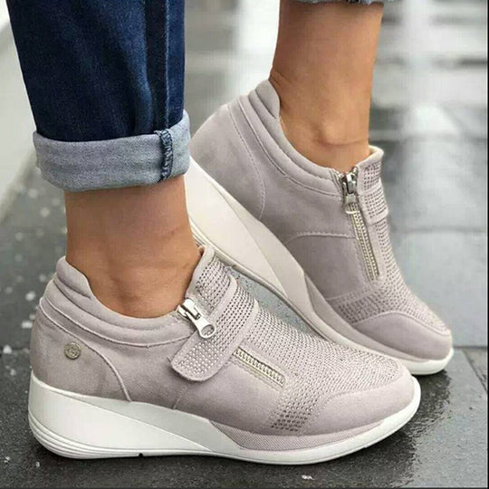 Kvinnor med dragkedja på plattformen Sneakers