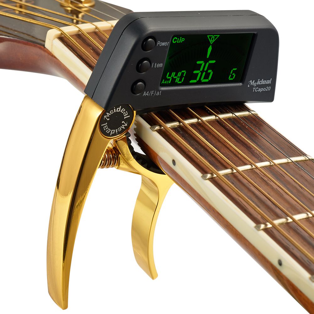 2-i-1 kapod och stämmare för gitarr